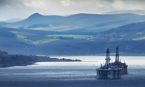 "Campaigners urge for more significant reductions in UK greenhouse gas emissions."